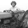 Madeline Fitzgerald works the field as a member of the Womens Land Army. 